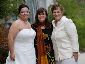 Wedding couple with officiant